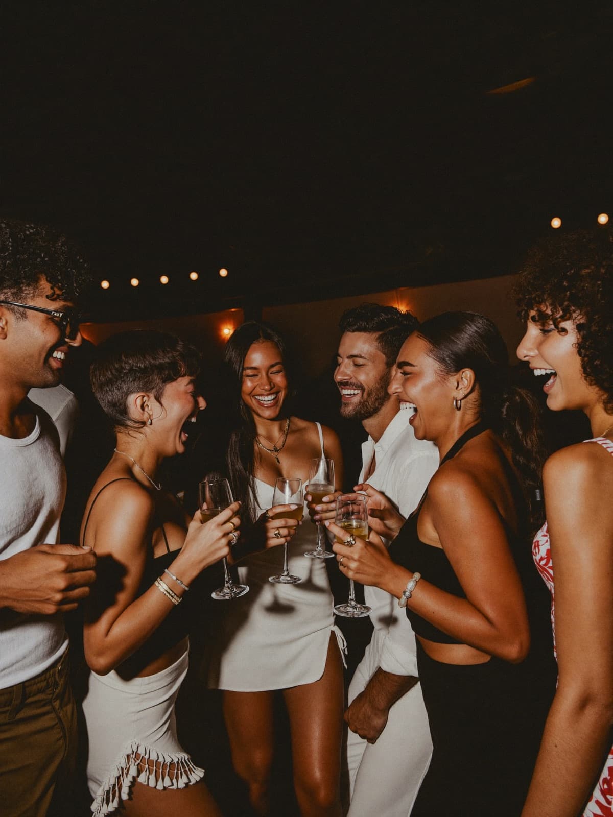 Friends laughing together at a dance social